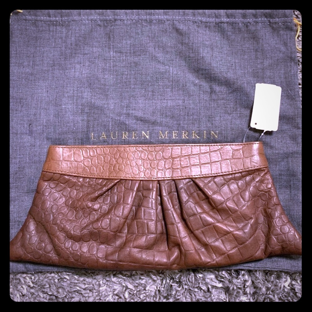SOLD Brand new Lauren Merkin leather clutch